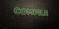 COMPILE -Realistic Neon Sign on Brick Wall background - 3D rendered royalty free stock image