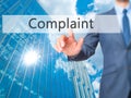 Complaint - Businessman click on virtual touchscreen.