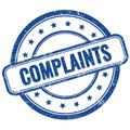 COMPLAINTS text on blue grungy round rubber stamp