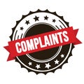 COMPLAINTS text on red brown ribbon stamp