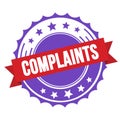 COMPLAINTS text on red violet ribbon stamp