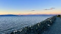 complete calm no wind no waves on the pacific ocean looks like a lake on Vancouver island blue tranquility and peace a Royalty Free Stock Photo