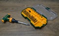 Professional T-Handle Screwdriver Set with All Bits on Rustic Wood Royalty Free Stock Photo