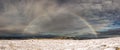 Complete rainbow over the mountains in the Vosges. Royalty Free Stock Photo