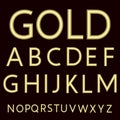 A complete set of Latin letters made from gold wire with a matte surface.