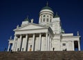 Complete view of Helsinki cathedral with steps and blue sky