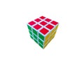 Completed Rubik`s cube on white background