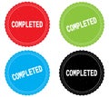 COMPLETED text, on round wavy border stamp badge. Royalty Free Stock Photo