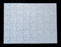 Completed White Jigsaw Puzzle on Black Background Royalty Free Stock Photo