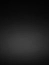 A completely black, dark, and featureless background with a subtle gradient of grey from bottom to overlaying text or Keywords: Royalty Free Stock Photo