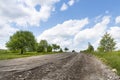 Completely destroyed road, difficult traffic area, threat of damage to vehicle Royalty Free Stock Photo