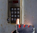 Completion of dialing code on the intercom by pressing the call button Royalty Free Stock Photo