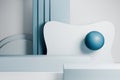 Complex abstract geometric display with a blue sphere and clean white shapes Royalty Free Stock Photo