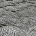 A complex, abstract pattern of intersecting black lines forms a wavy, grid-like surface Royalty Free Stock Photo