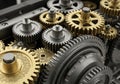 Arrangement of interlocking gears, showcasing both metallic and brass Royalty Free Stock Photo