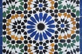 Beautiful Moroccan mosaic creating symmetrical patterns out of small colorful tiles in a traditional Moorish, Islamic design Royalty Free Stock Photo