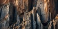 Complex cliff face with cubic rock shapes and contrasting tones. Royalty Free Stock Photo
