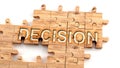 Complex and confusing decision: learn complicated, hard and difficult concept of decision,pictured as pieces of a wooden jigsaw Royalty Free Stock Photo