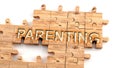 Complex and confusing parenting: learn complicated, hard and difficult concept of parenting,pictured as pieces of a wooden jigsaw