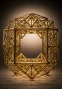 A complex geometric structure composed of interlocking golden metallic rods forms Royalty Free Stock Photo