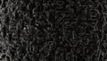 Complex interconnected geometric patterns on glossy black surface, featuring intricate maze-like structures.
