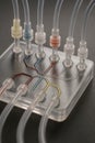 A complex lab-on-a-chip microfluidic device with colorful fluid channels Royalty Free Stock Photo