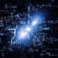 As integrals, summations, and functions, are scattered across a dark, Royalty Free Stock Photo