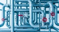Complex network of industrial metal pipes and valves Royalty Free Stock Photo