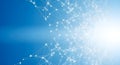 Complex network structure with interconnected nodes and lines against a blue background with bright light Royalty Free Stock Photo