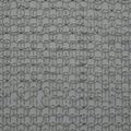A complex pattern of intertwining steel hexagons forms an intricate mesh. The Royalty Free Stock Photo
