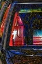Complex reflections on a car windows and hood Royalty Free Stock Photo