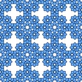 Complex seamless abstract pattern of curly stars in blue shades, white background