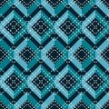 Complex seamless pattern of blue zigzag with cross white stitching