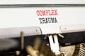 Complex trauma symbol. Concept words Complex trauma typed on white paper on old retro typewriter. Beautiful white background. Royalty Free Stock Photo