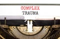 Complex trauma symbol. Concept words Complex trauma typed on white paper on old retro typewriter. Beautiful white background. Royalty Free Stock Photo