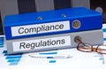 Compliance and regulations binders Royalty Free Stock Photo