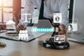 Male judge in a courtroom using the gavel with governance icon on virtual screen Royalty Free Stock Photo