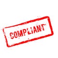 Compliant red rubber stamp isolated on white.