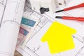 Components for electric installations, shape of house, construction diagrams, work tools and polish currency banknotes. Building Royalty Free Stock Photo
