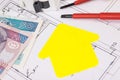 Components for electric installations, shape of house, construction diagrams, work tools and polish currency banknotes. Building Royalty Free Stock Photo