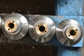 Components for the production of valves in the factory. Metal part of the valve brass insert