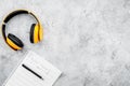 Composer office desk . Workplace of musician with headphones and notes stone background top view mockup Royalty Free Stock Photo