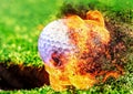 Composite background with fire effect on 3d rendering golf ball at the moment of entering the golf cup Royalty Free Stock Photo