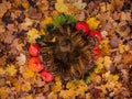 composite background photo for newborn, a basket with fur standing on autumn leaves surrounded by pumpkins. top view flat lay 4k Royalty Free Stock Photo