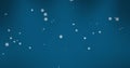 Composite of christmas snow falling over blue background Royalty Free Stock Photo