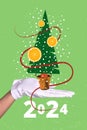 Composite collage picture image of hand glove hold tree decoration orange fruit happy merry christmas new year theme x Royalty Free Stock Photo