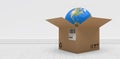 Composite 3d image of digitally generated image of globe in cardboard box Royalty Free Stock Photo