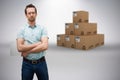 Composite 3d image of serious warehouse manager standing with arms crossed Royalty Free Stock Photo