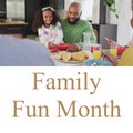 Composite of family fun month text and african american father and daughter eating lunch at home Royalty Free Stock Photo