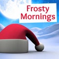 Composite of frosty mornings text over santa claus hat and snowy winter landscape background